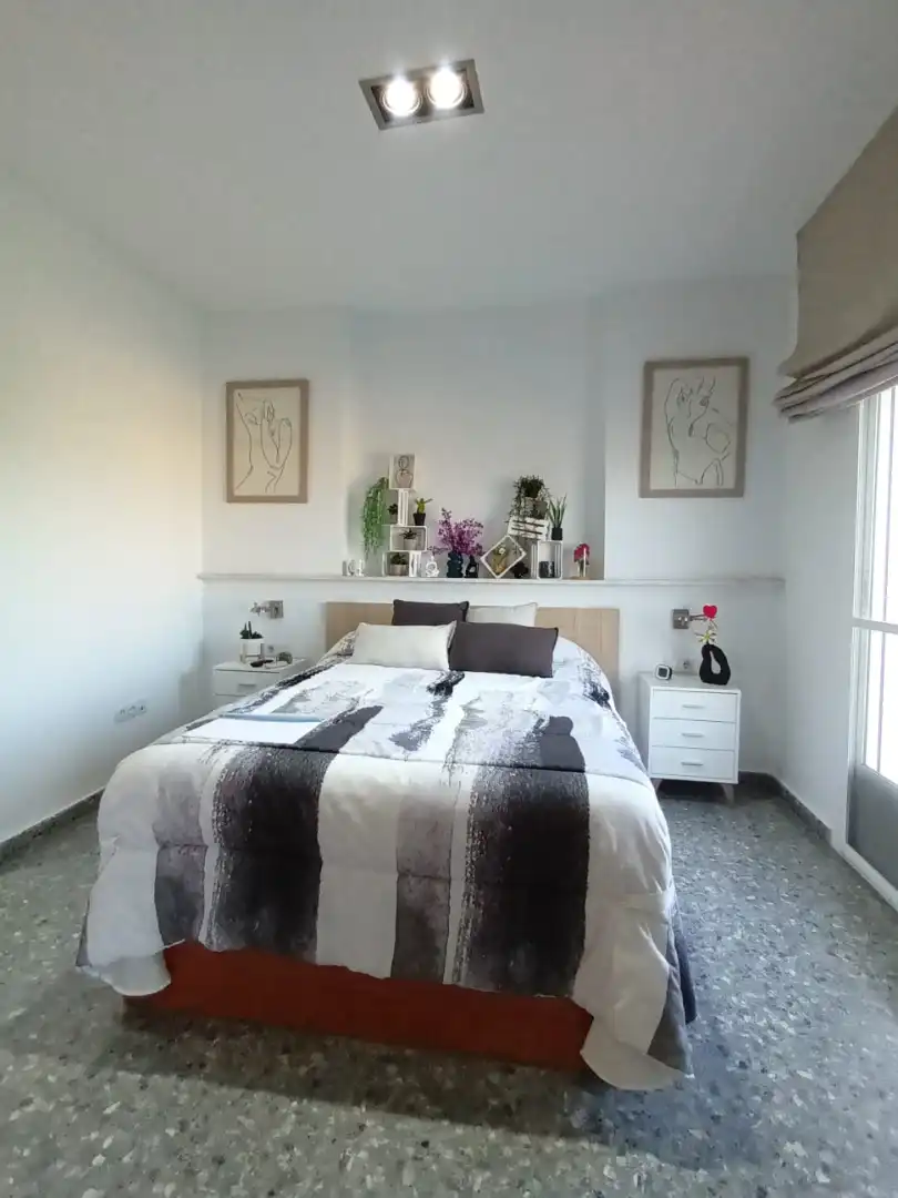 Habitación de Casa adosada en venta en Mérida con Aire acondicionado, Terraza y Trastero