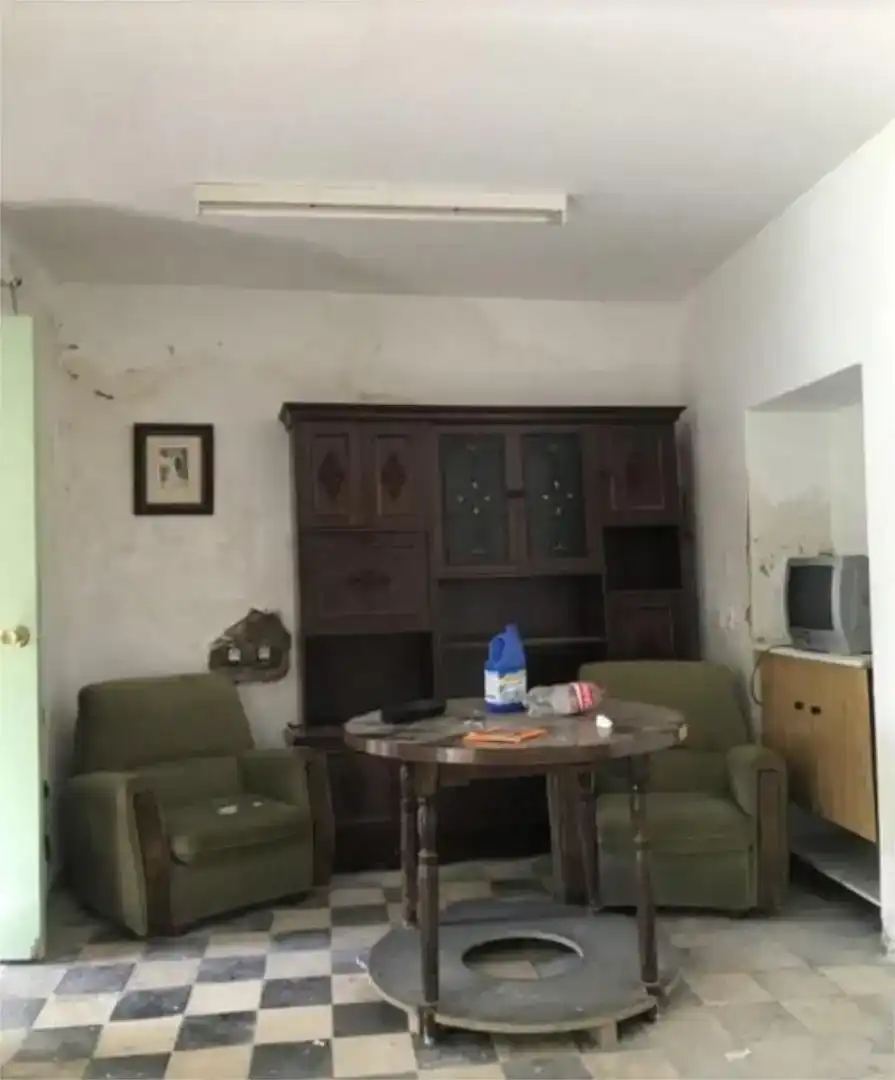 Sala de estar de Casa adosada en venta en El Pedroso, Sevilla