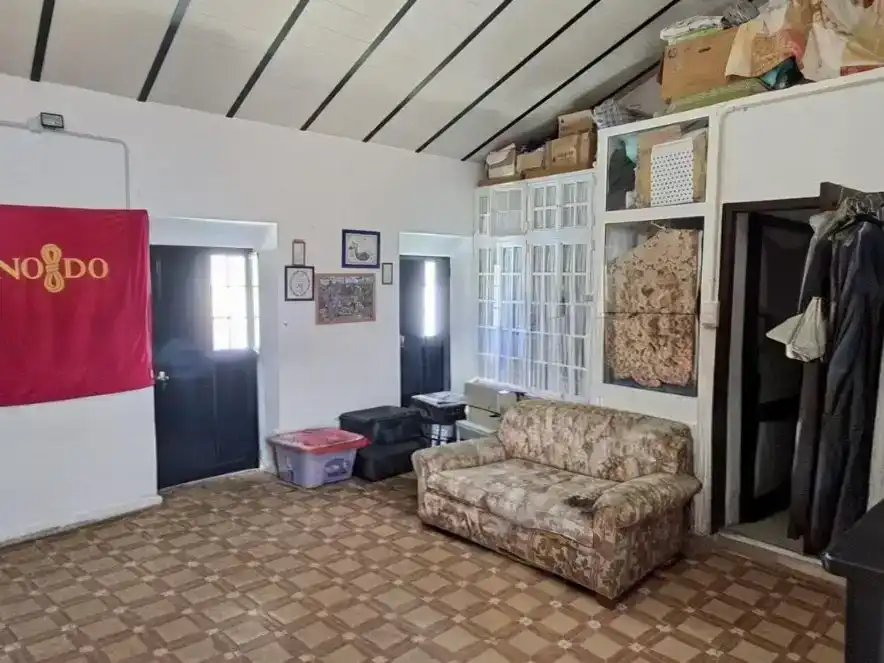 Sala d'estar de Casa adosada en venda en Estepa amb Aire condicionat i Balcó