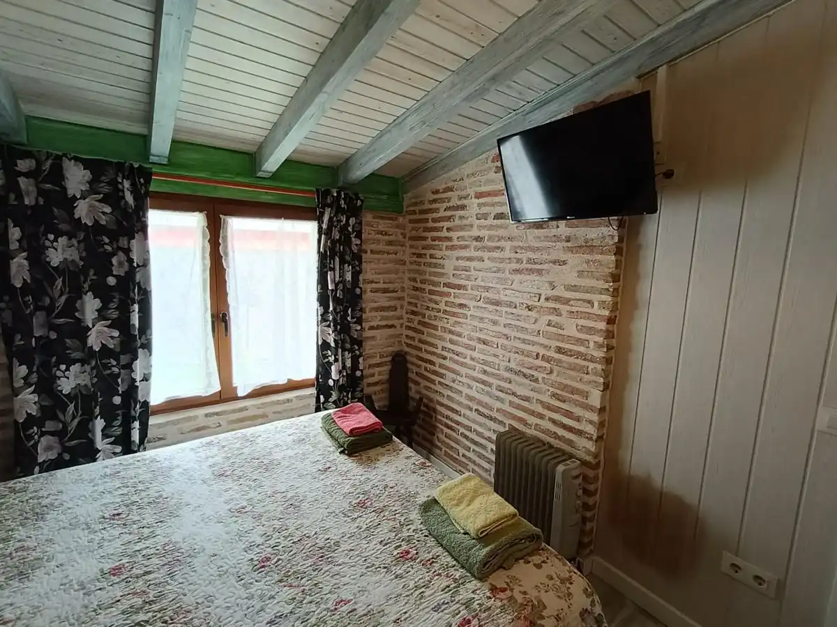 Dormitori de Casa adosada en venda en Llanes amb Calefacció, Jardí privat i Terrassa