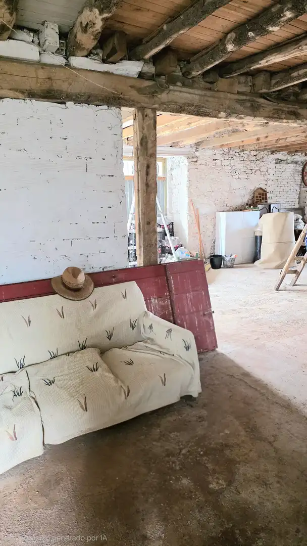 Sala d'estar de Casa adosada en venda en Valle de Valdelucio