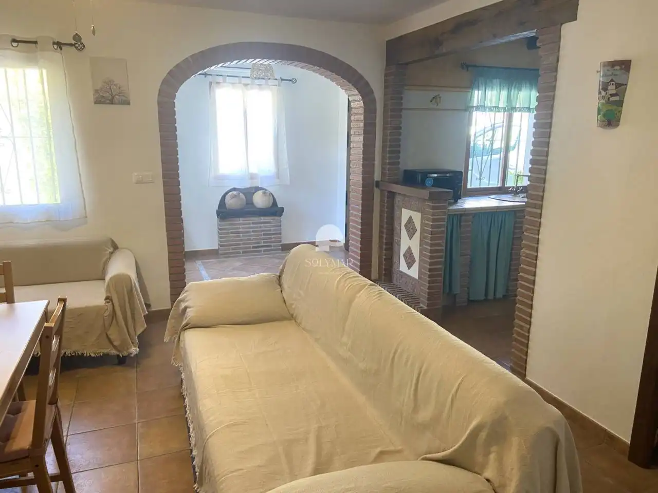 Sala d'estar de Finca rústica de lloguer en Árchez amb Aire condicionat i Piscina