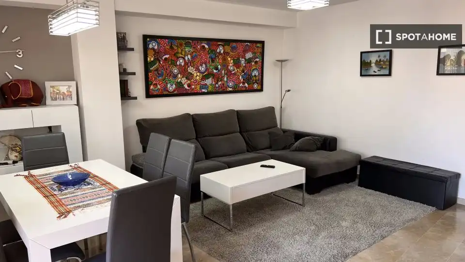 Sala d'estar de Apartament per a compartir en Rascanya