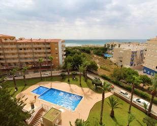 Swimming pool of Attic for sale in Guardamar del Segura  with Air Conditioner, Terrace and Balcony