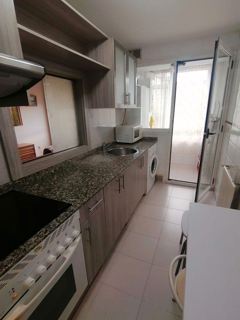 Kitchen of Apartment to rent in Gijón   with Heating, Parquet flooring and Storage room