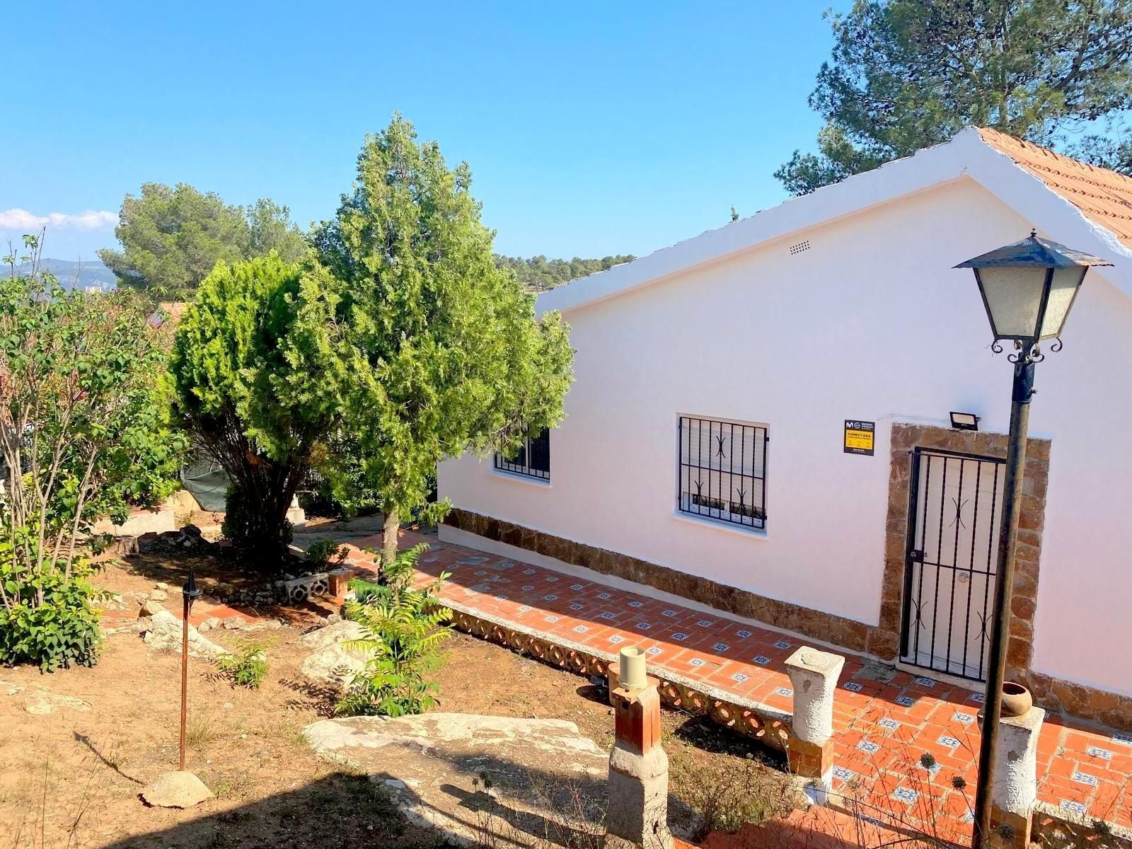 Vista exterior de Casa o xalet en venda en Mogente / Moixent amb Aire condicionat, Calefacció i Jardí privat