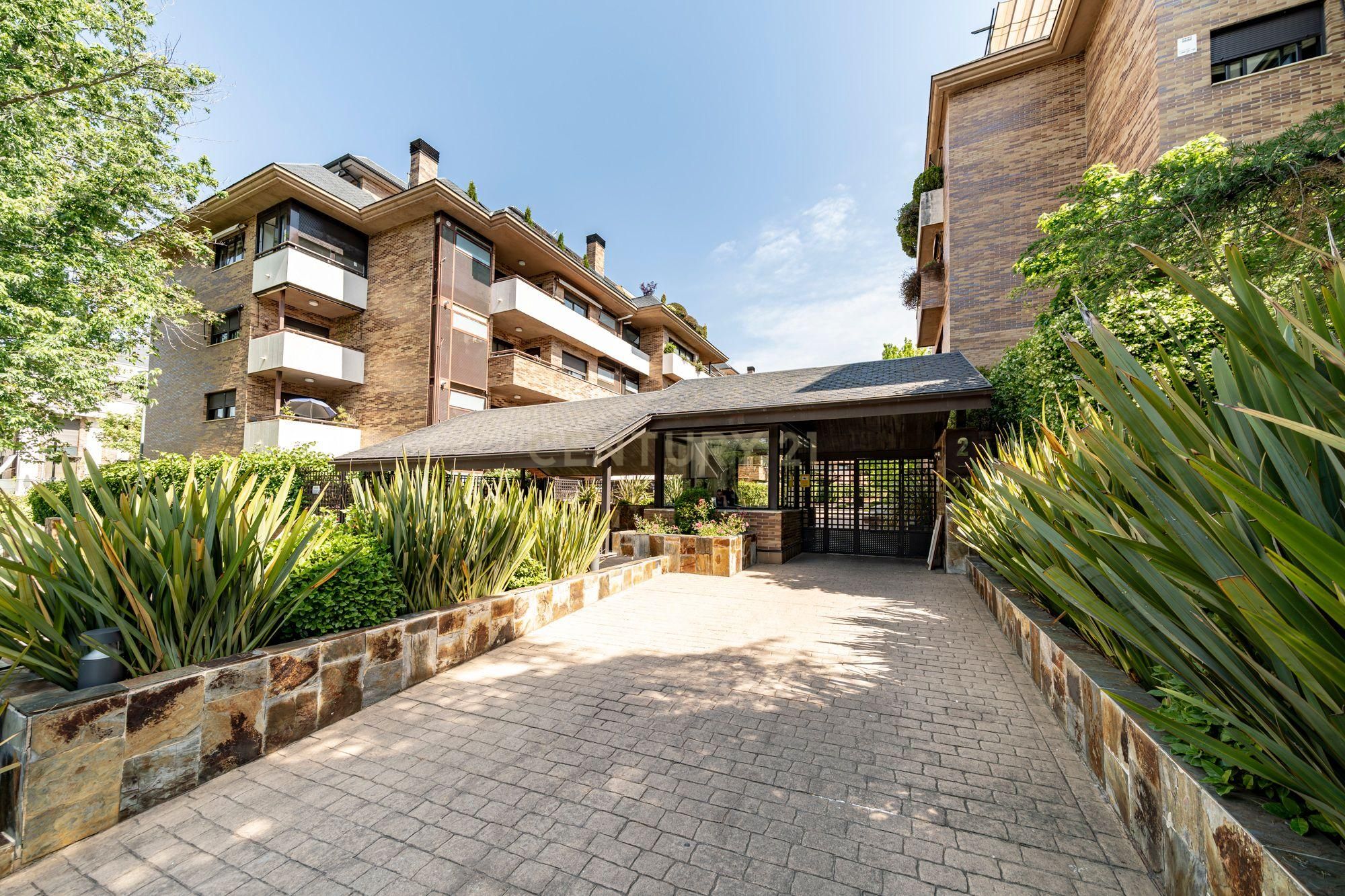 Exterior view of Flat for sale in Majadahonda  with Air Conditioner, Private garden and Storage room