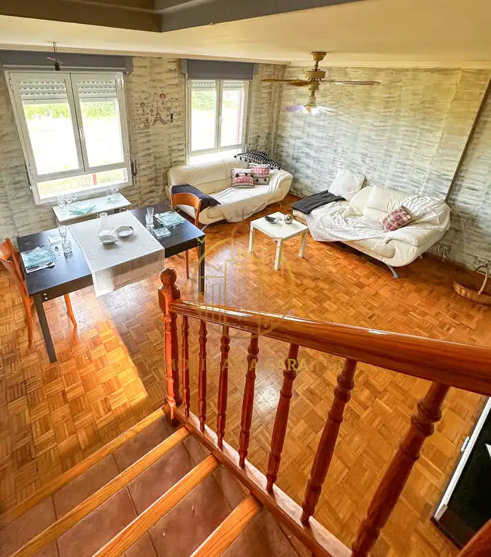 Sala d'estar de Casa adosada en venda en Funes amb Traster