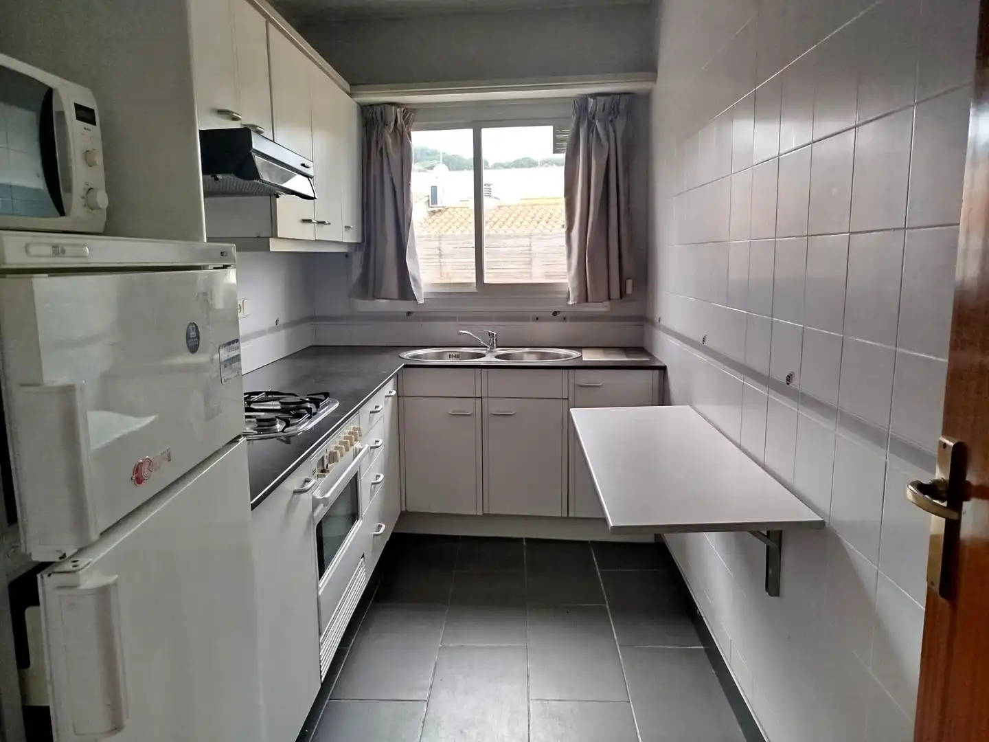 Kitchen of Attic for sale in Canet de Mar  with Heating and Balcony