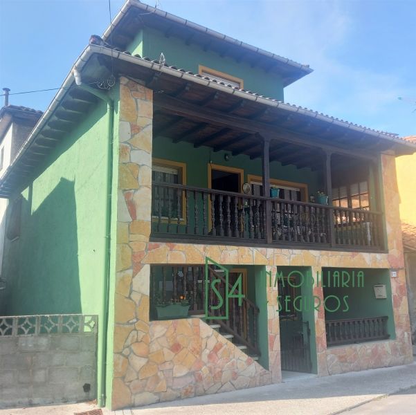 Exterior view of Single-family semi-detached for sale in Piloña  with Parquet flooring, Terrace and Storage room