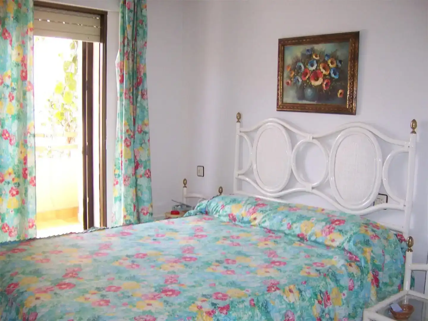 Dormitori de Casa adosada de lloguer en Salobreña amb Aire condicionat, Jardí privat i Traster