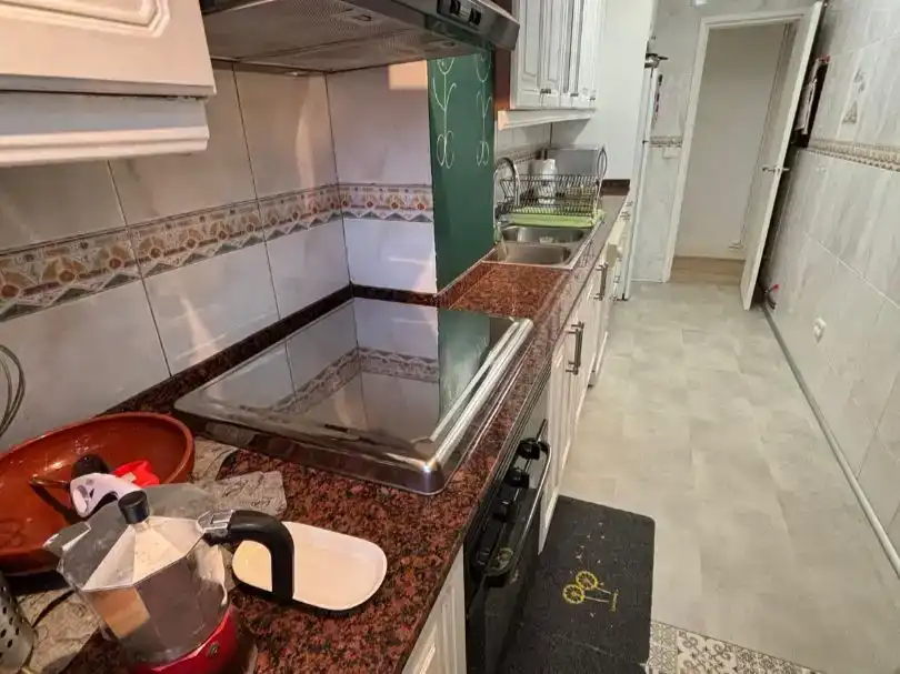 Kitchen of Flat for sale in Vilanova i la Geltrú  with Air Conditioner, Swimming Pool and Balcony