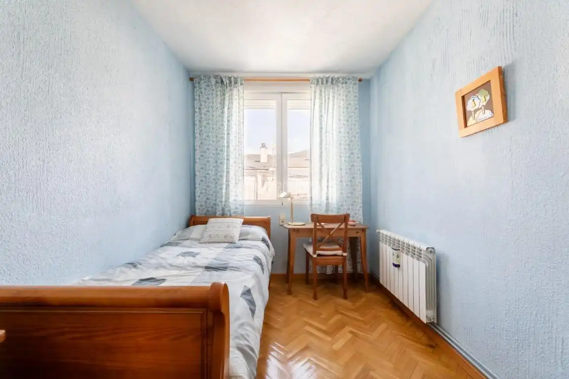 Habitación de Casa adosada en venta en Hoyo de Manzanares con Aire acondicionado, Calefacción y Jardín privado