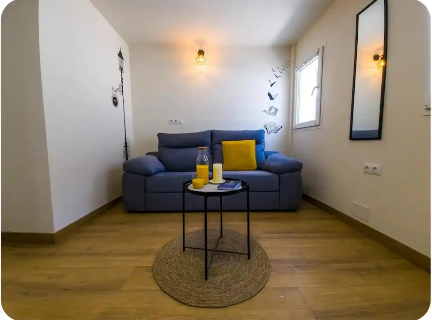 Sala de estar de Casa adosada en venta en Málaga con Aire acondicionado, Parquet y Amueblado