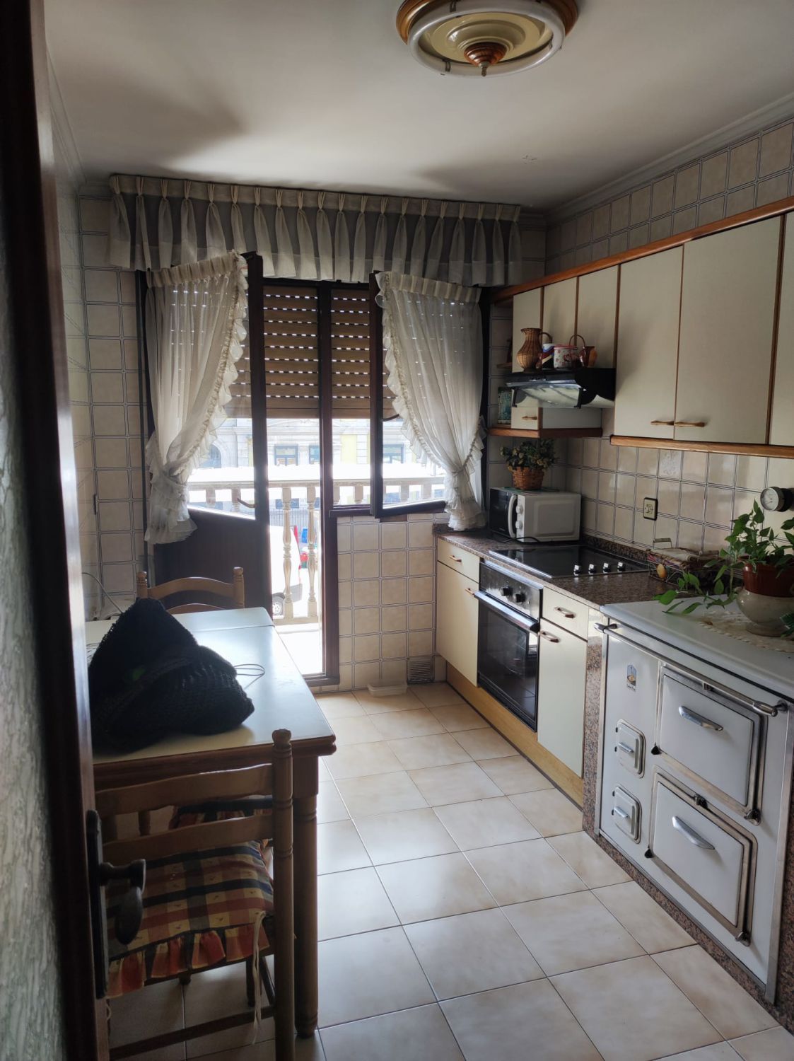 Cuina de Pis de lloguer en Grado amb Calefacció, Terrassa i Moblat