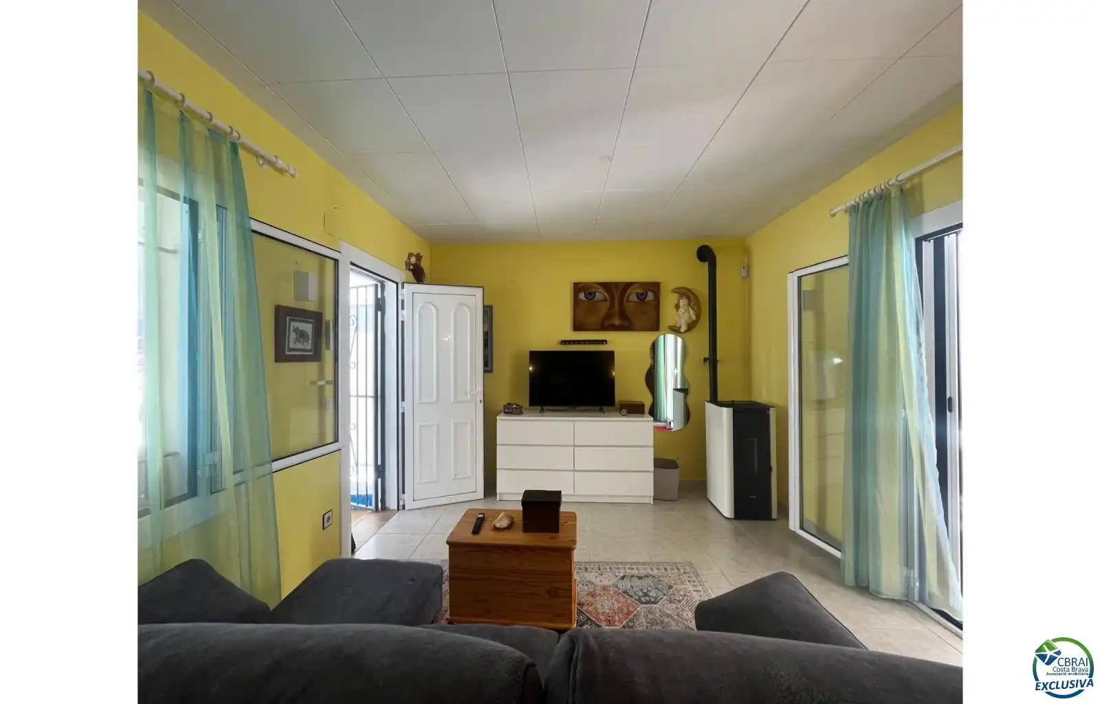 Sala d'estar de Casa o xalet en venda en Roses amb Terrassa i Moblat