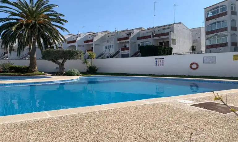 Schwimmbecken von Erdgeschoss zum Verkauf in Roses mit Privatgarten, Möbliert und Gemeinschaftspool
