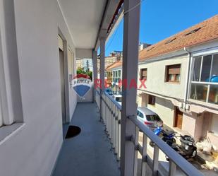 Vista exterior de Casa adosada en venda en Vigo  amb Balcó