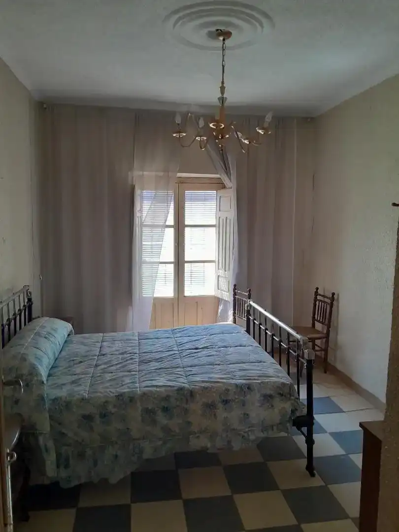 Dormitori de Casa adosada en venda en Arroyo del Ojanco amb Balcó