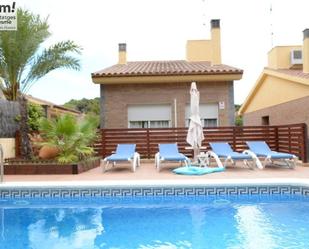 Swimming pool of House or chalet for sale in Pineda de Mar  with Air Conditioner, Terrace and Swimming Pool