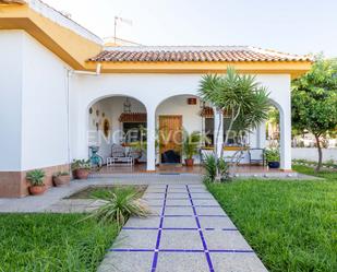 Exterior view of House or chalet for sale in Palomares del Río  with Air Conditioner, Heating and Private garden