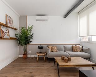 Sala d'estar de Apartament en venda en  Madrid Capital amb Aire condicionat i Calefacció