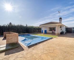 Swimming pool of House or chalet for sale in Sevilla la Nueva  with Air Conditioner and Swimming Pool