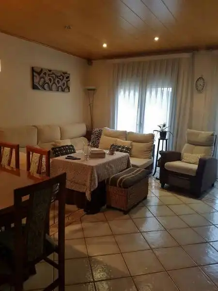 Sala d'estar de Casa o xalet de lloguer en Palamós amb Aire condicionat i Terrassa