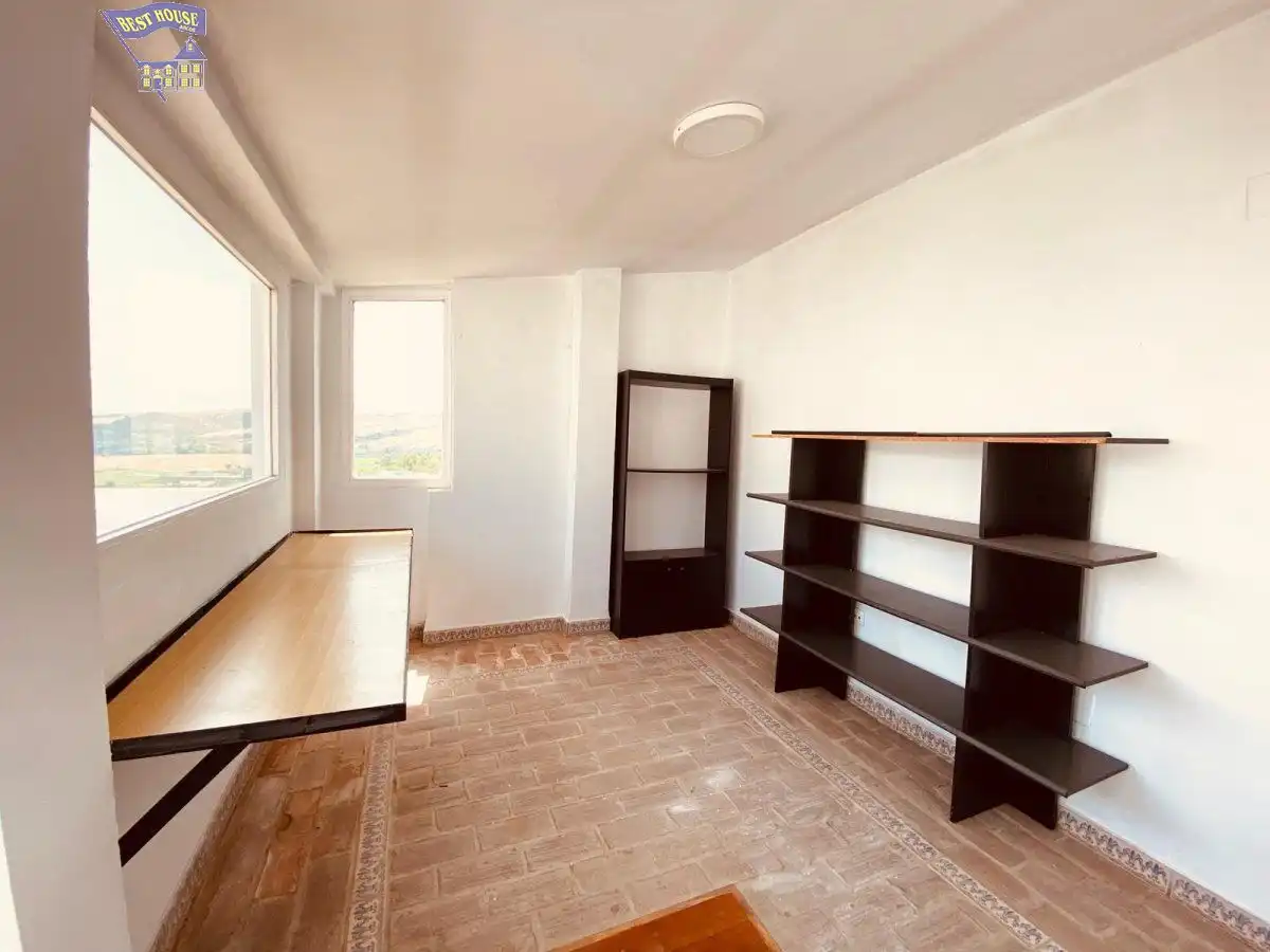 Dormitori de Apartament de lloguer en Arcos de la Frontera amb Aire condicionat, Terrassa i Moblat