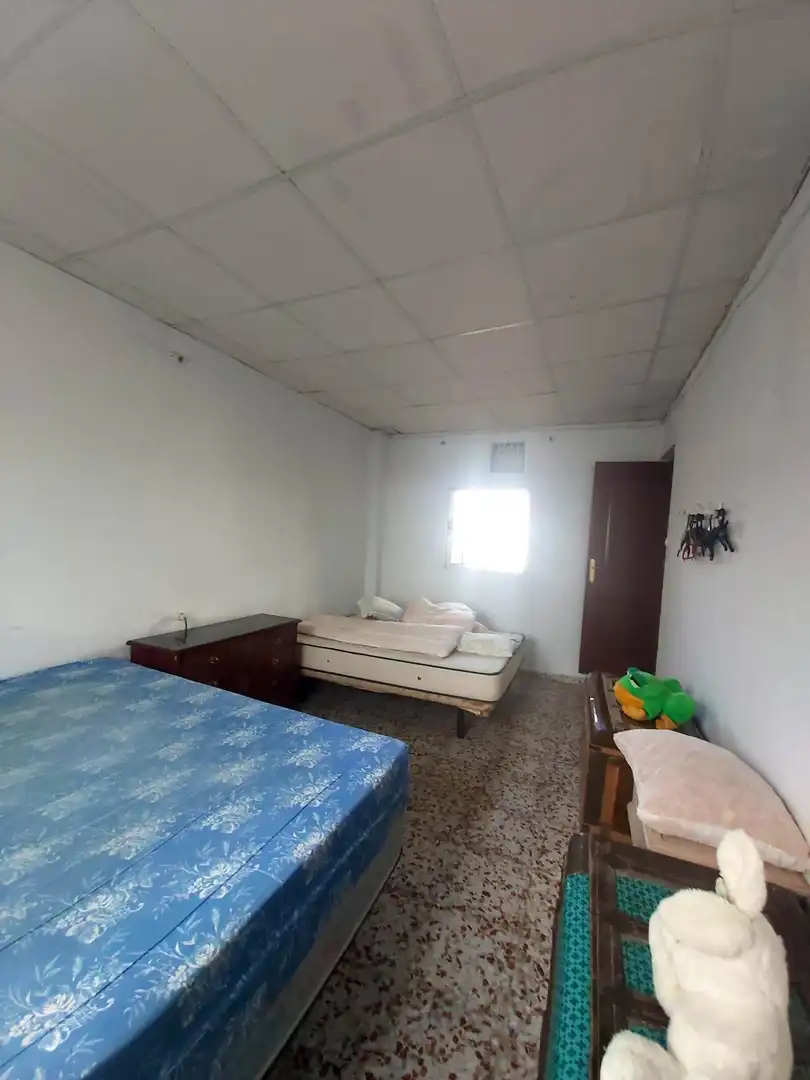 Habitación de Casa o chalet en venta en Utrera con Aire acondicionado, Jardín privado y Trastero