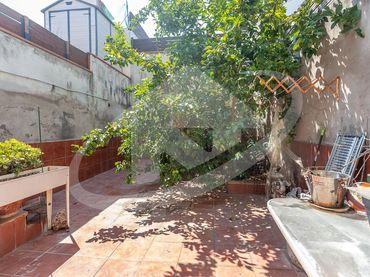 Adossat amb jardí en venda a Poble
