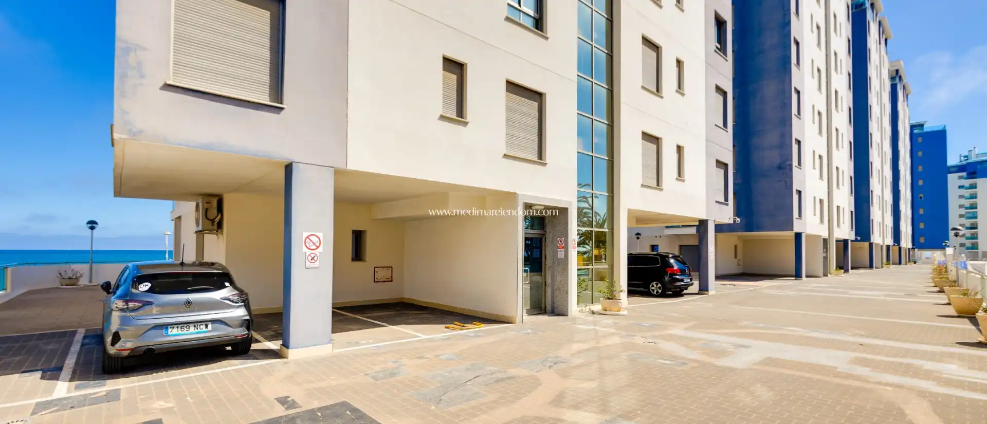 Parking of Duplexes for sale in La Manga del Mar Menor  with Air Conditioner, Heating and Private garden