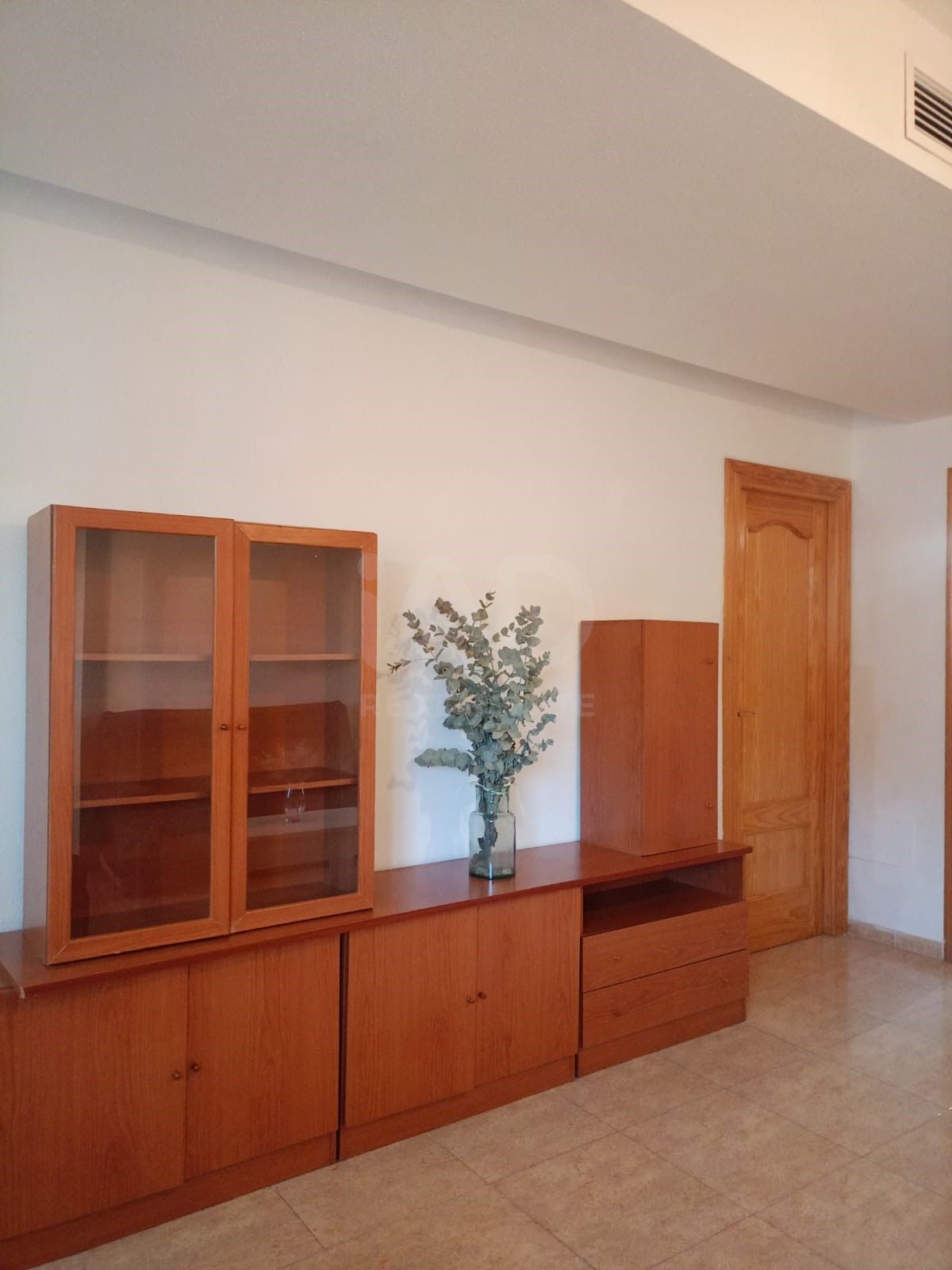 Sala d'estar de Casa adosada en venda en Lorca amb Piscina