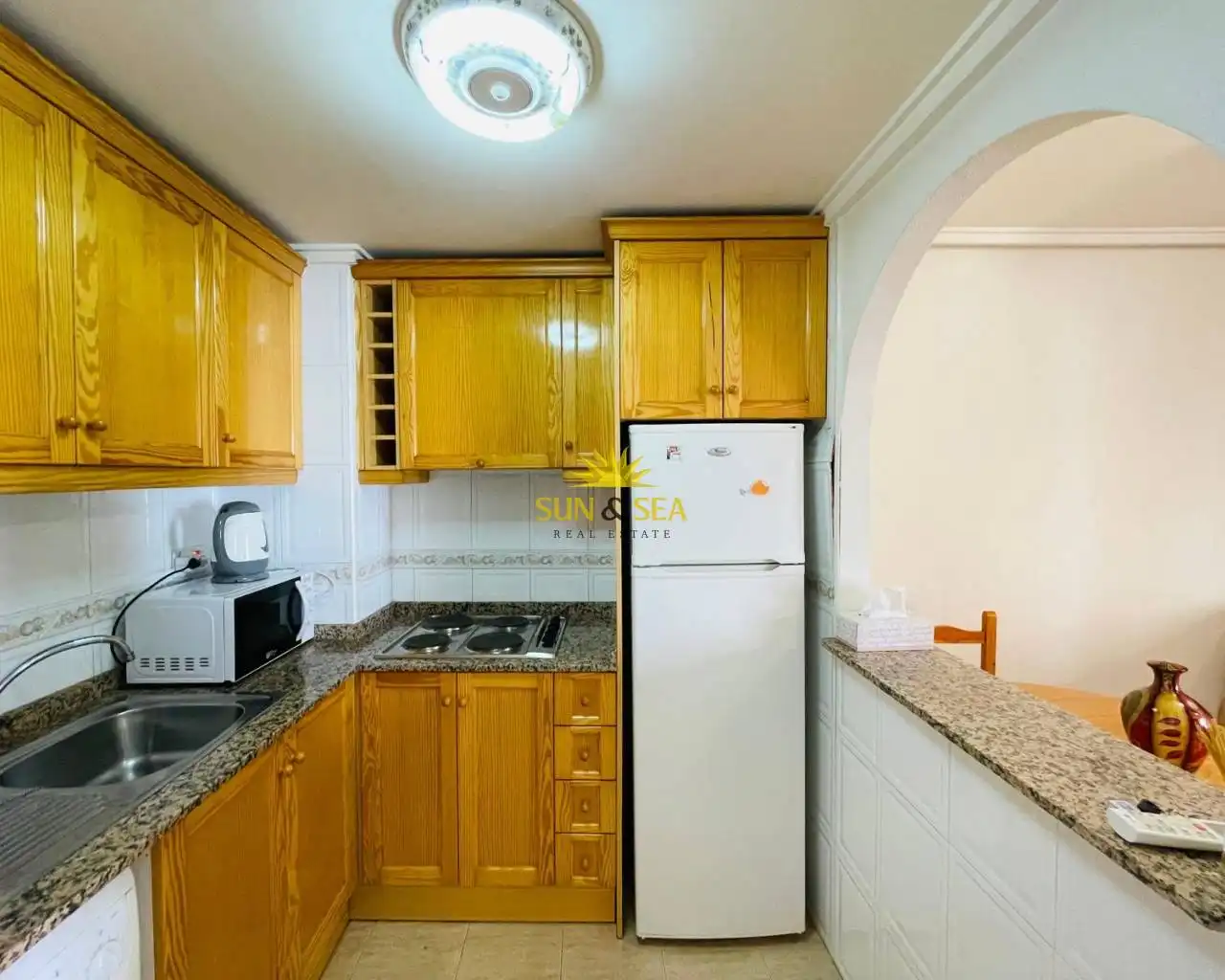 Cocina de Apartamento de alquiler en Torrevieja con Aire acondicionado, Calefacción y Piscina