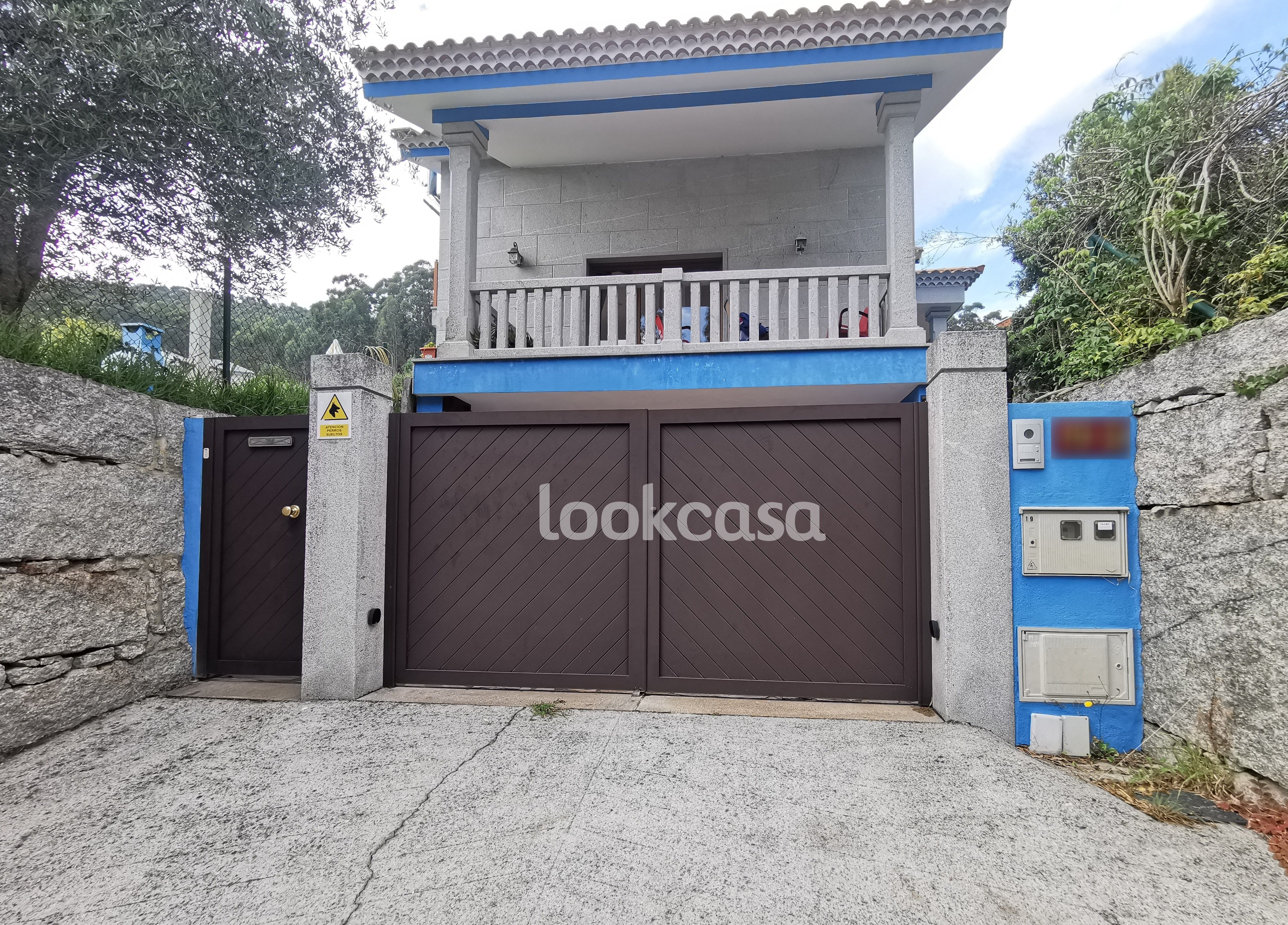 Vista exterior de Casa o xalet en venda en Sanxenxo amb Calefacció, Jardí privat i Terrassa