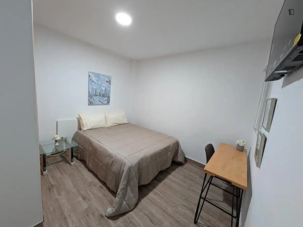 Dormitori de Casa o xalet per a compartir en Málaga amb Aire condicionat, Moblat i Rentadora