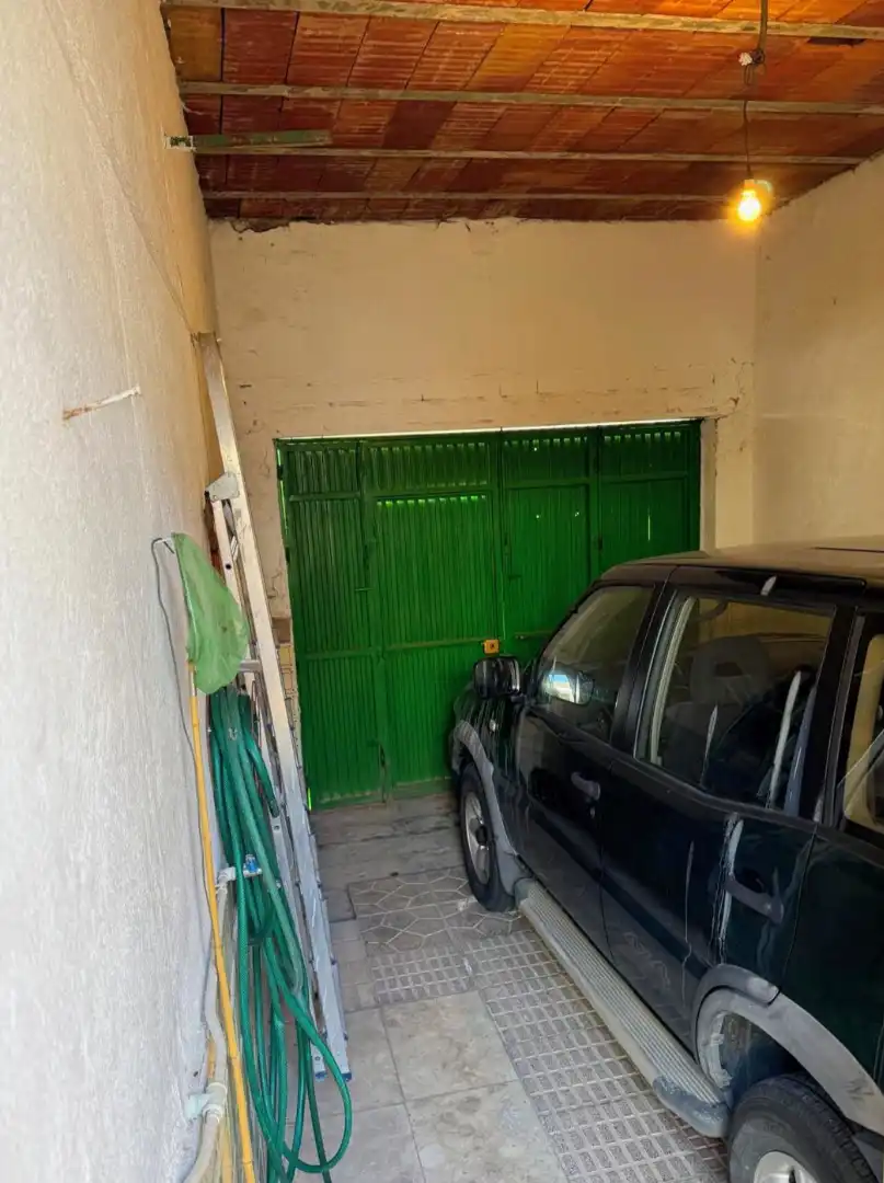 Parking de Casa adosada en venta en Puertollano con Jardín privado, Trastero y Amueblado