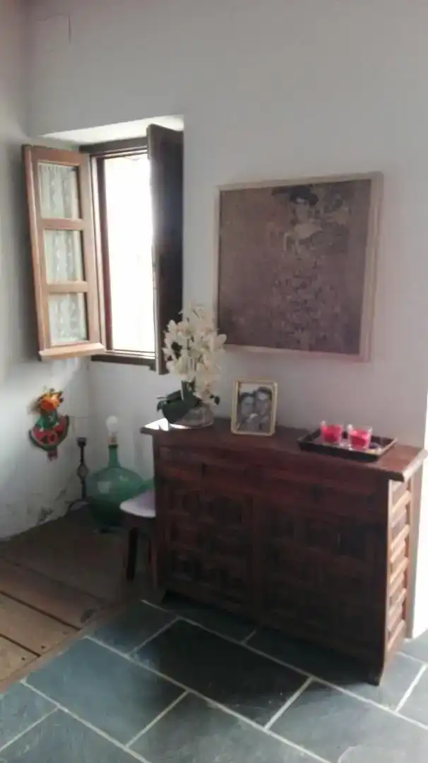 Sala d'estar de Casa adosada en venda en Alcántara amb Aire condicionat, Moblat i Forn