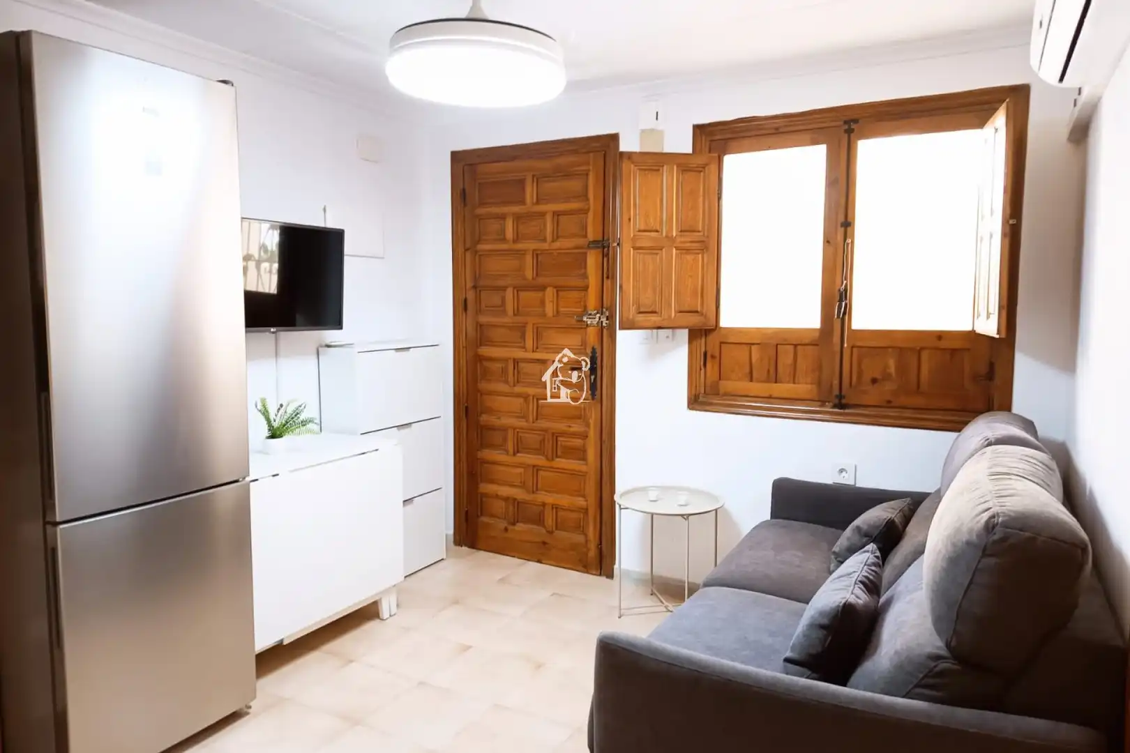 Sala d'estar de Casa adosada de lloguer en San Fulgencio amb Aire condicionat, Jardí privat i Terrassa