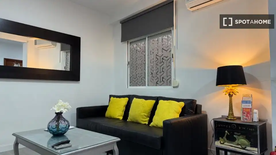 Sala de estar de Apartamento para compartir en Málaga con Aire acondicionado, Terraza y Amueblado