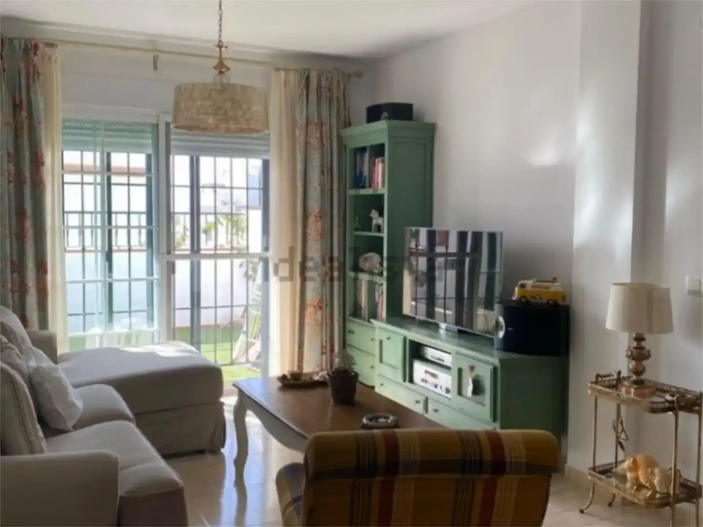Sala de estar de Casa adosada en venta en Nerja con Aire acondicionado y Piscina