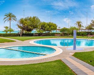 Swimming pool of Flat for sale in Gandia  with Air Conditioner, Heating and Parquet flooring