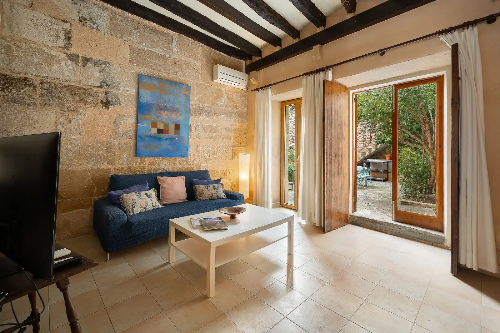 Sala de estar de Casa adosada en venta en Pollença con Aire acondicionado, Calefacción y Terraza