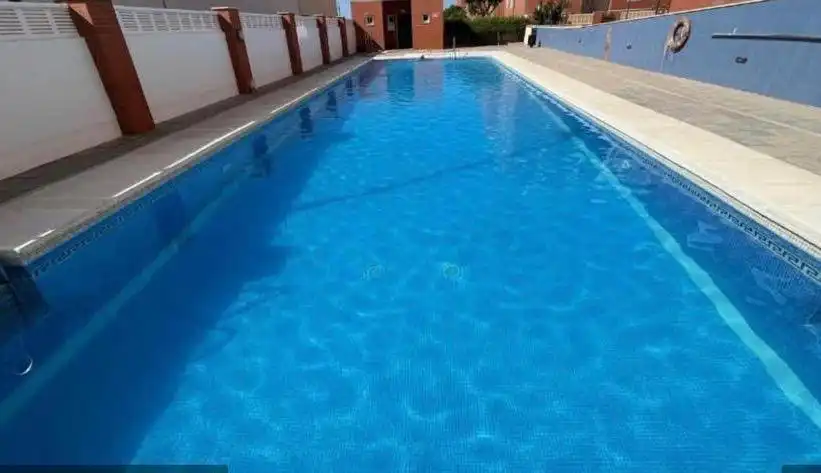 Swimming pool of Apartments for rent in Almería  with Air Conditioner, Heating and Furnished