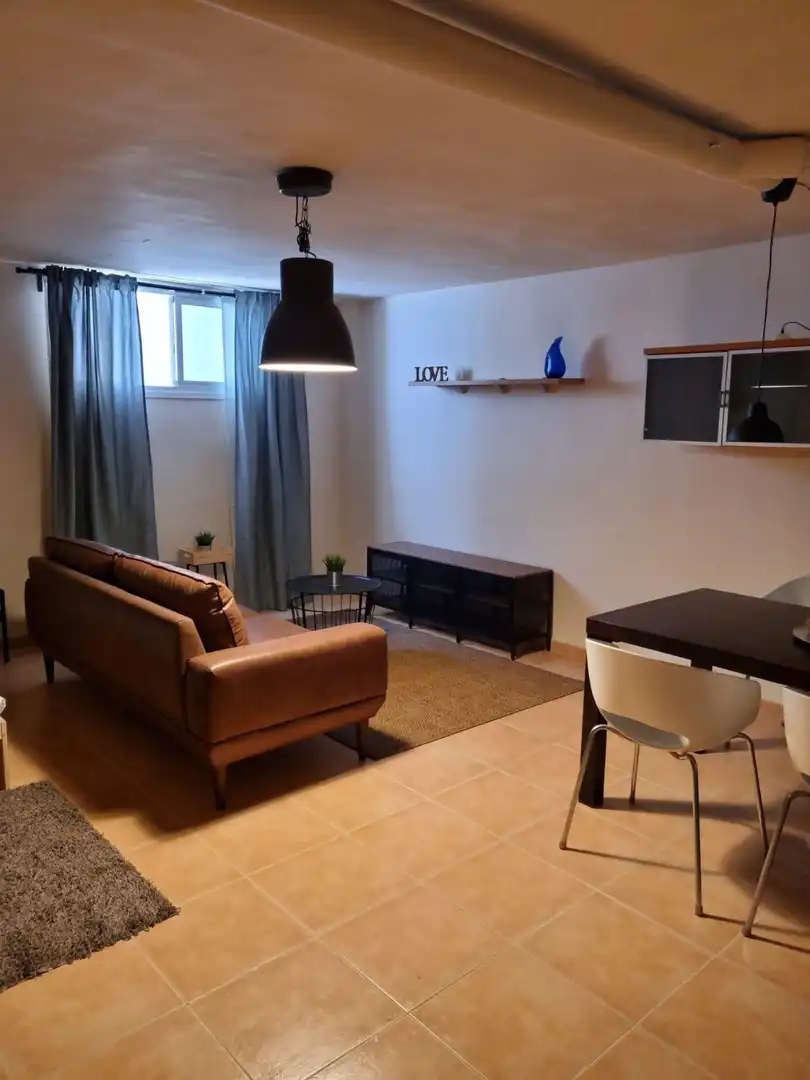 Sala de estar de Casa adosada de alquiler en Moncada con Aire acondicionado, Calefacción y Jardín privado