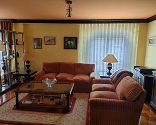 Living room of Flat for sale in Gijón   with Heating, Parquet flooring and Storage room