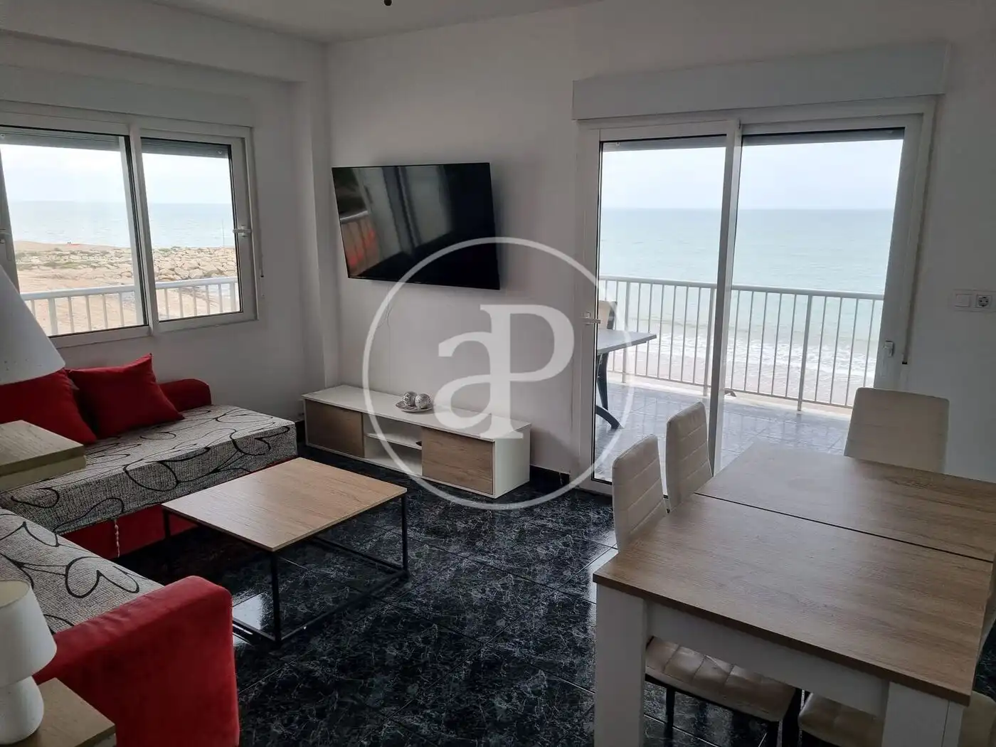 Sala de estar de Piso en venta en Tavernes de la Valldigna con Calefacción, Terraza y Amueblado