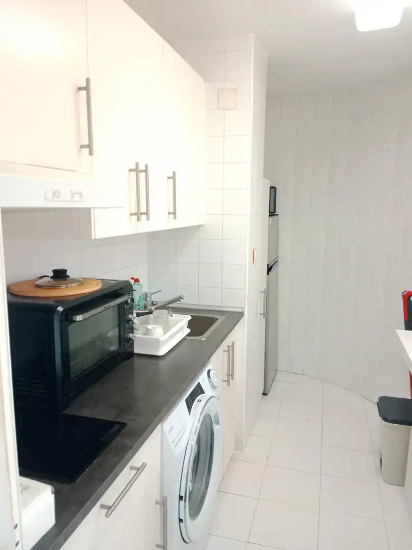 Cuina de Apartament en venda en Benidorm amb Aire condicionat, Jardí privat i Terrassa