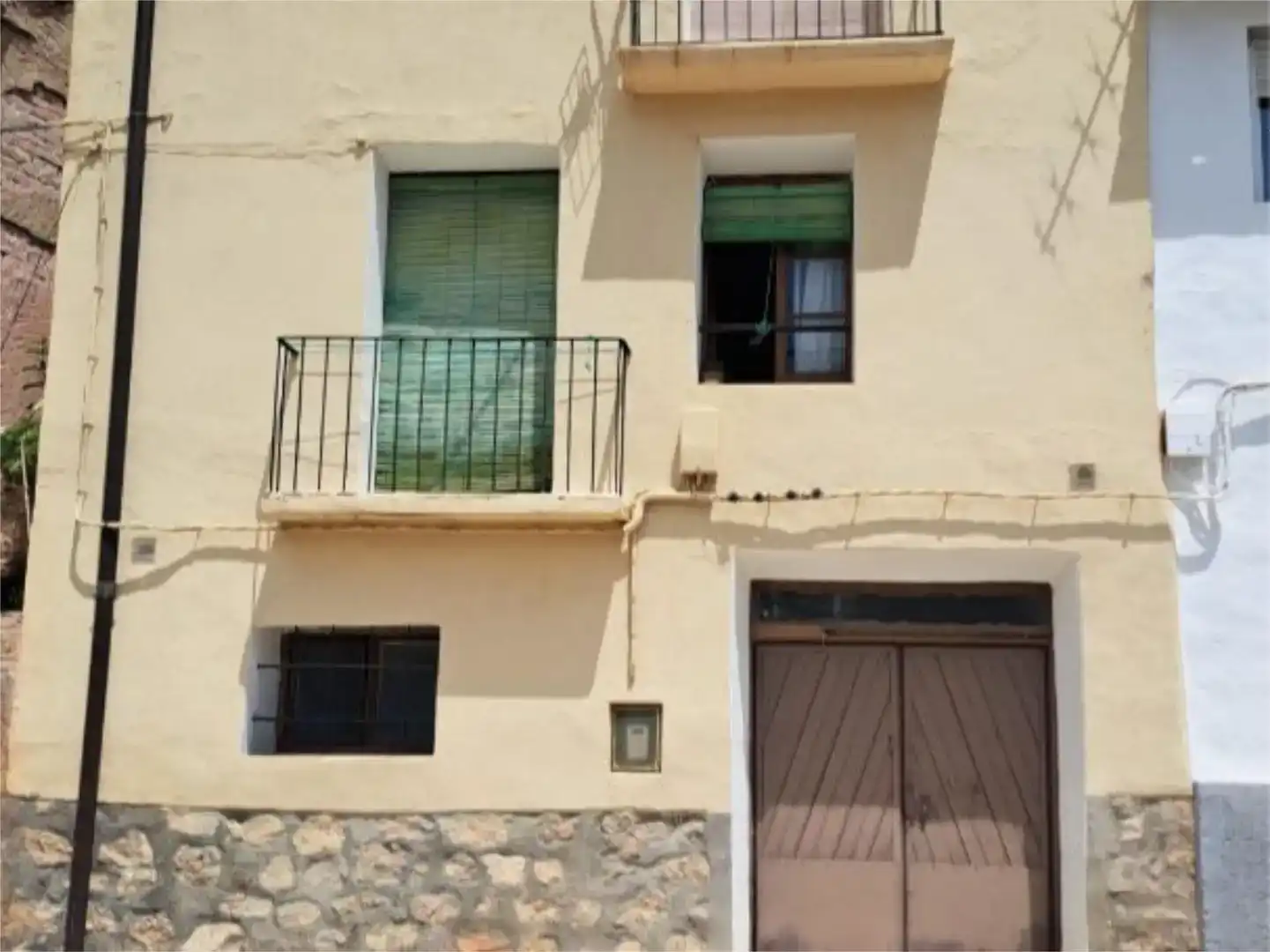 Vista exterior de Casa adosada en venda en Torrijo de la Cañada amb Balcó