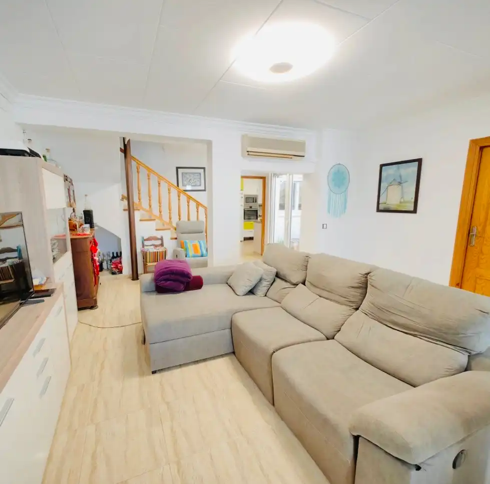 Sala d'estar de Casa adosada en venda en Dénia amb Aire condicionat, Calefacció i Terrassa